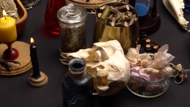 Occult Esoteric Witch Doctor Still Life Focus Human Skull Candle — Stock Video