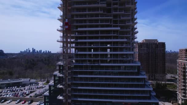 Empty construction site, incomplete high rise building with beams made of concrete and steel reinforcement. Apartment residential skyscraper. Real Estate and housing shortage crises. — Vídeos de Stock