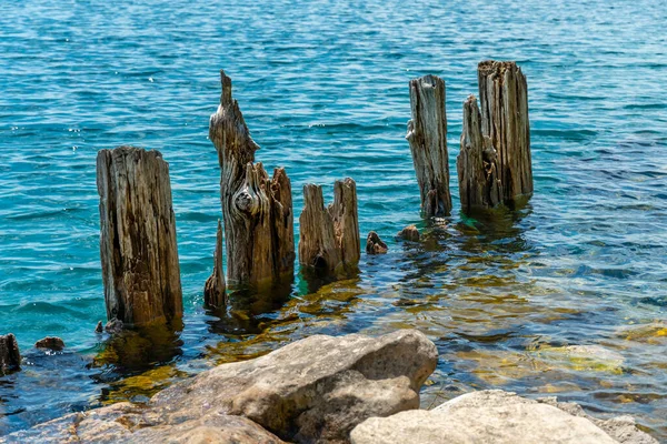 Landscape Huron Lake Water Old Withered Wooden Dock Posts Marina — Stockfoto