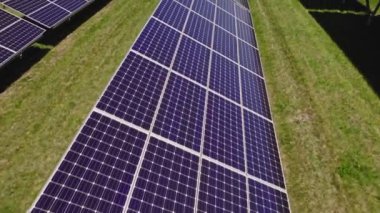 Solar panels installation and mounting on the farm. Alternative power plant with solar cells farm for charging and storing electric power.