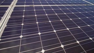 Close up of solar power panels at farm. Green energy development and research due climate change and environmental impact. Carbon footprint reduce and eco-friendly energy solutions.