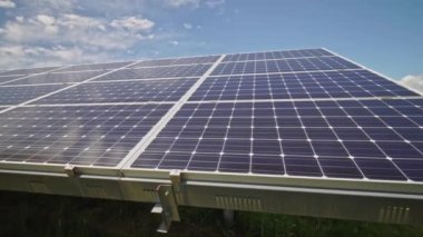 Large industrial farm of Solar energy farm for production of solar power. Solar panels technology for Green energy to fight climate change and environmental impact by reducing deforestation.