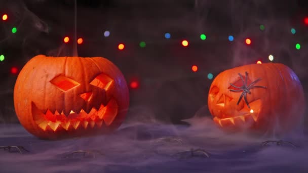 Two Pumpkins Smoke Candle Dark Background Flashing Lights Everywhere Haze — Stock Video