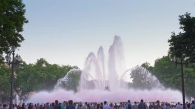 Spain Barcelona - May 28, 2022 Magic singing magic fountains of Montjuic, people watch the performance that takes place several times a week