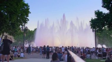 Spain Barcelona - May 28, 2022 Magic singing magic fountains of Montjuic, people watch the performance that takes place several times a week