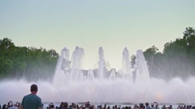 Spain Barcelona - May 28, 2022 Magic singing magic fountains of Montjuic, people watch the performance that takes place several times a week