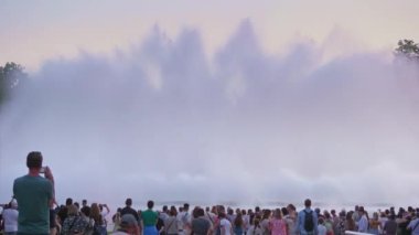 Spain Barcelona - May 28, 2022 Magic singing magic fountains of Montjuic, people watch the performance that takes place several times a week