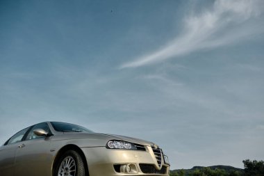 04.27.2021. Bursa. Turkey. Low angle view of beautiful Alfa Romeo, Alfa Romeo 156, emotion of mechanics.
