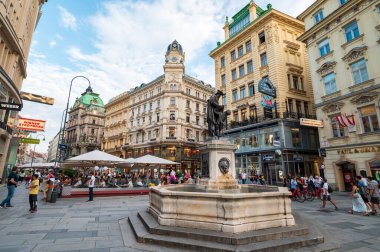Vienna, Austria - August 11, 2022: Vienna downtown near the main city square Stephansplatz in the 1st city circle with always busy streets full of tourists in the famous capital city in Europe clipart