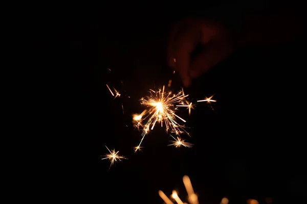 Närbild Glitter Ljus Med Mörk Bakgrund — Stockfoto