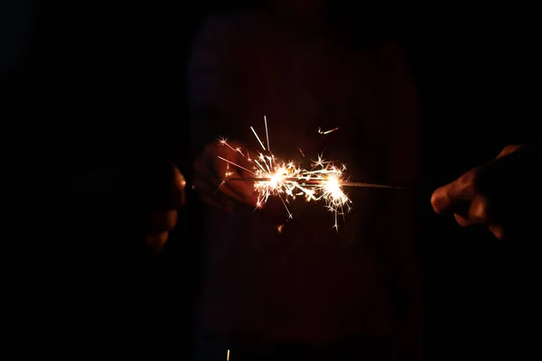 Närbild Glitter Ljus Med Mörk Bakgrund — Stockfoto