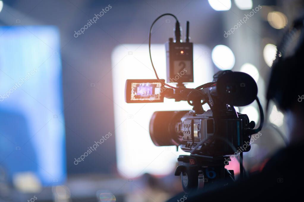 videographer close up, cameraman, man with camera, movie