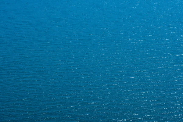 Wasseroberfläche Blauer Wellenhintergrund — Stockfoto