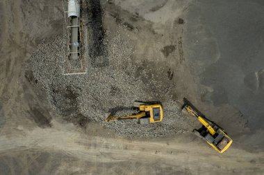 Kazıcı kaya kepçeleme, ağır iş