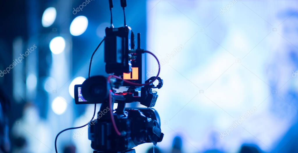 video camera,videographer close up, cameraman