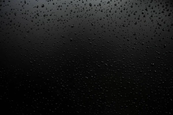 Gotas Agua Suelo Con Fondo Negro —  Fotos de Stock