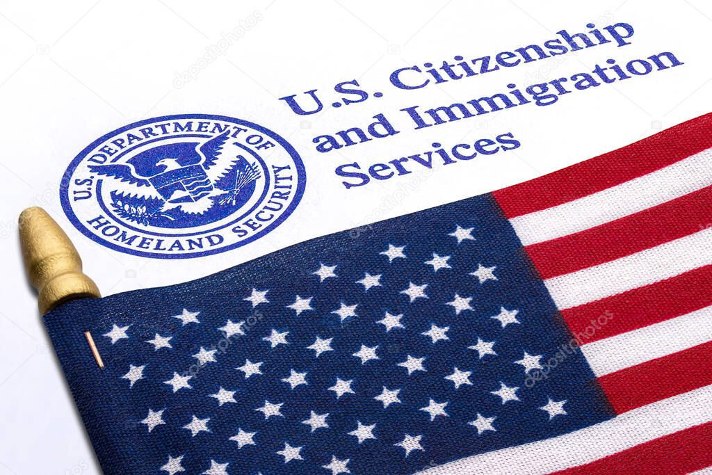 U.S. Citizenship and Immigration Services. US Department of Homeland Security. Visa United States of America. Green Card US Permanent resident. Immigrant or Immigration document. American Flag.