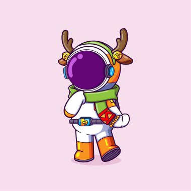 Astronot, resmin Noel 'ini kutlamak için geyik kafası bandı takıyor.