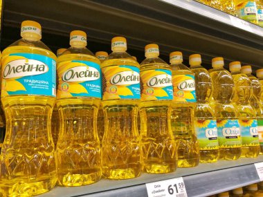 13.08.2022, Ukraine, Kharkiv, a shelf in a supermarket .sunflower oil in a bottle on a store shelf