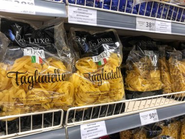 25.08.2022, Ukraine, Kharkov, Packaging of pasta products of different brands and on store shelves