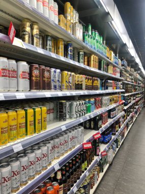 18.08.2022 Ukraine, Kharkiv, shelf rack in a supermarket with different types of beer