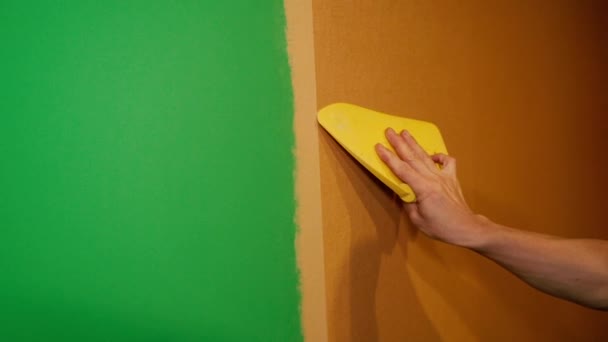 Construction Works Builder Glues Wallpaper Apartment — Video Stock