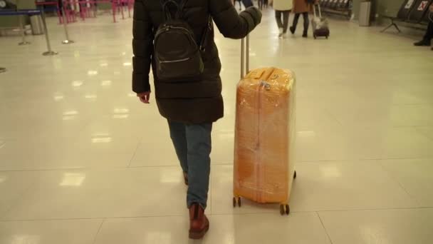 Yellow Suitcase Woman Carrying Yellow Suitcase — Wideo stockowe