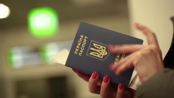 Biometric Passport Ukraine Woman Hand Flips Passport — стоковое видео