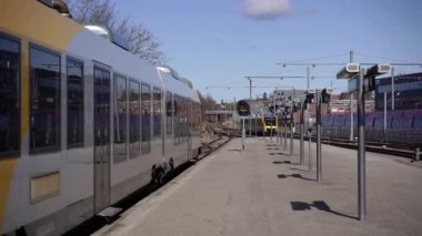 Railway transport. The train is on the platform.