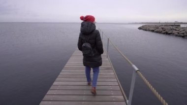 Travel. A woman walks around the city of Copenhagen. Denmark.