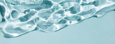 Banner jel serumu dokusu yaptı. Makyaj ve kozmetik dokusu arka plan, cilt ürünü ve güzellik kremi