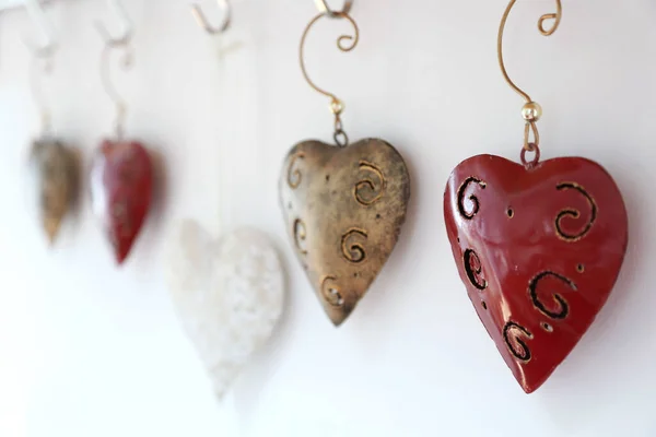 Decorative Forged Hearts Hang White Wall Valentine Day Red Decorative — Zdjęcie stockowe