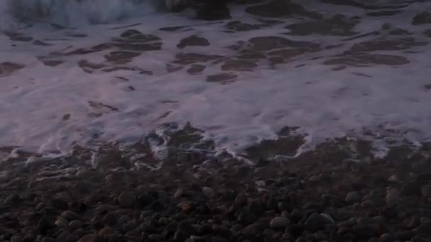 Extreme sea wave crushing coast. Sea storm, Sea water splash on winter sunset, splashing sea-spray water foam — Stockvideo
