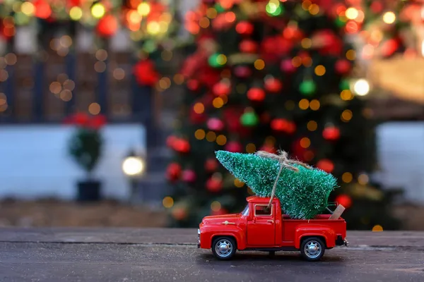 Retro Toy Red Car Truck Carrying Tiny Christmas Tree Background — Stock Photo, Image