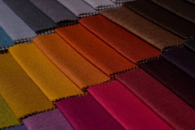 Mobilya kumaşı örnekleri. Çok renkli kumaş dokusu arka planı..