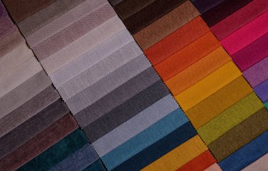 Mobilya kumaşı örnekleri. Çok renkli kumaş dokusu arka planı..