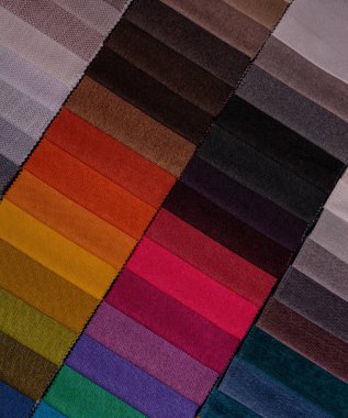 Mobilya kumaşı örnekleri. Çok renkli kumaş dokusu arka planı..