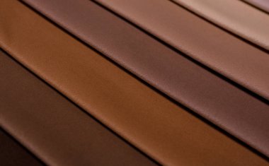 Mobilya kumaşı örnekleri. Çok renkli kumaş dokusu. Velours. Pastel kahverengi renkler..