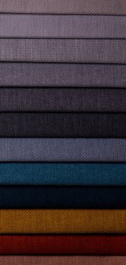 Mobilya kumaşı örnekleri. Çok renkli kumaş dokusu arka planı..