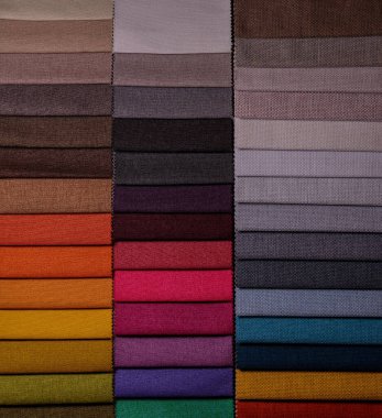 Mobilya kumaşı örnekleri. Çok renkli kumaş dokusu arka planı..
