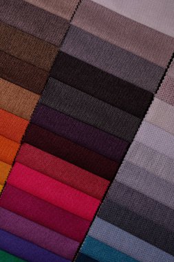 Mobilya kumaşı örnekleri. Çok renkli kumaş dokusu arka planı..