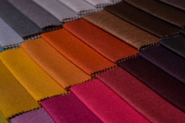 Mobilya kumaşı örnekleri. Çok renkli kumaş dokusu arka planı..