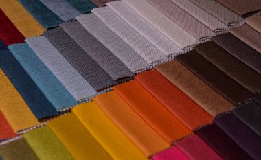 Mobilya kumaşı örnekleri. Çok renkli kumaş dokusu arka planı..