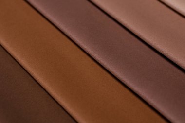 Mobilya kumaşı örnekleri. Çok renkli kumaş dokusu. Velours. Pastel kahverengi renkler..