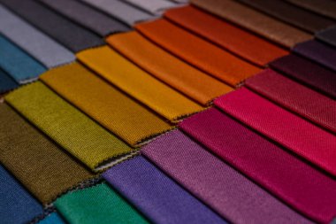 Mobilya kumaşı örnekleri. Çok renkli kumaş dokusu arka planı..