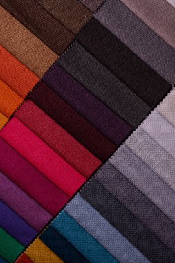 Mobilya kumaşı örnekleri. Çok renkli kumaş dokusu arka planı..