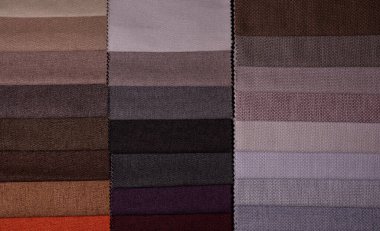 Mobilya kumaşı örnekleri. Çok renkli kumaş dokusu arka planı..