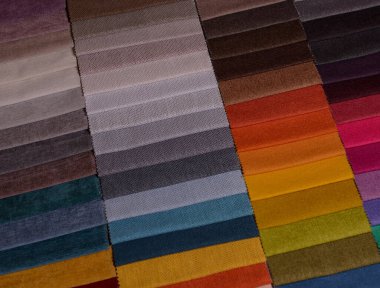 Mobilya kumaşı örnekleri. Çok renkli kumaş dokusu arka planı..