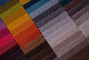 Mobilya kumaşı örnekleri. Çok renkli kumaş dokusu arka planı..