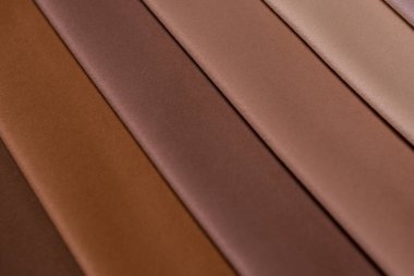 Mobilya kumaşı örnekleri. Çok renkli kumaş dokusu. Velours. Pastel kahverengi renkler..